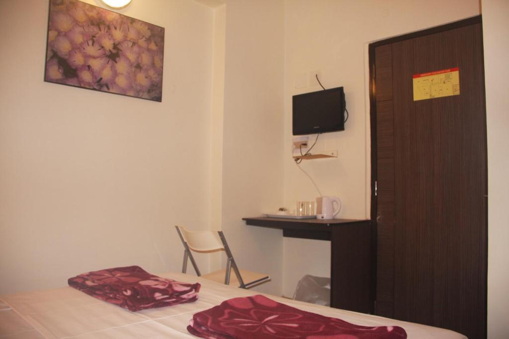 Down Town Guest House Колката Номер фото